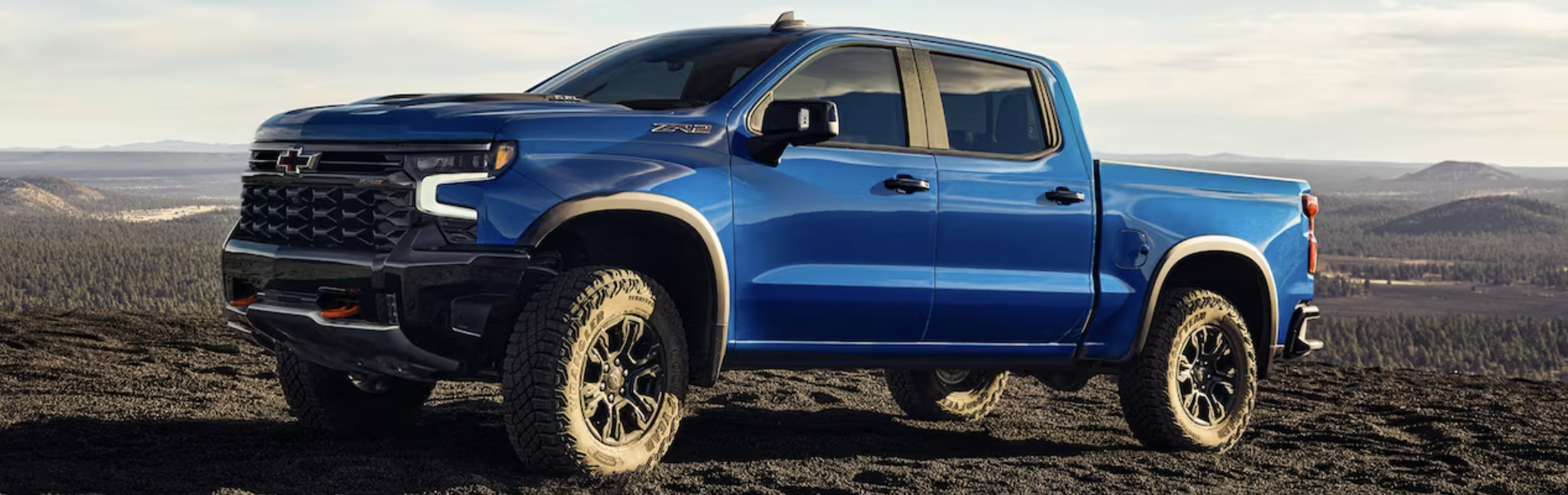 2024 Chevy Silverado 1500 in blue parking